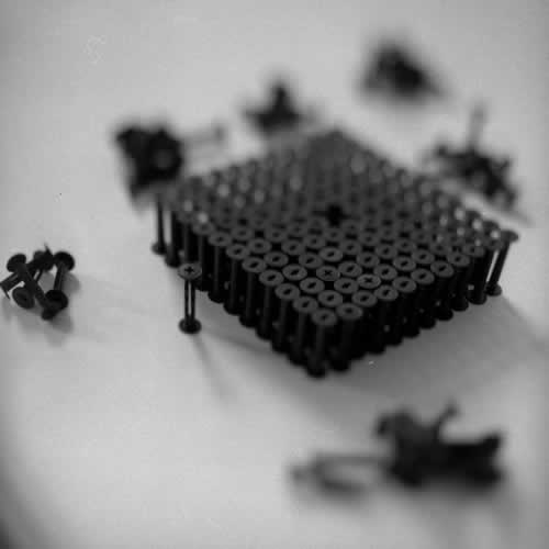 <body>
<p>This work was initially conceived of as a nod to the Terracotta Army of the Qin Emperor. Seeing that the film size ‘120’ for which these spools were manufactured is numerically 11²-1, I arranged this as a phalanx of 11 ranks of 11 and left the centre element out.</p>
<p>I thought I could also look at this omission as a flaw in the lattice and to see how the structure behaved over time, perhaps to model the corruption of power while I worked on the Dissent project with Chapel Arts. </p>
</body>
 Images Copyright Aldobranti® ©2008-'2025. All rights reserved.